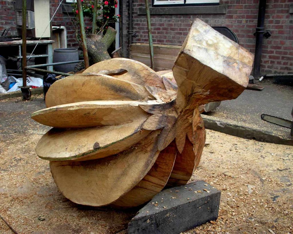 wood carved fruit shaped sculpture by Danny May